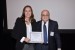 Dr. Nagib Callaos, General Chair, giving Ms. Raquel Cohen the best paper award certificate of the session "Computer Science and Engineering I." The title of the awarded paper is "Q-Learning Multi-Objective Sequential Optimal Sensor Parameter Weights."
